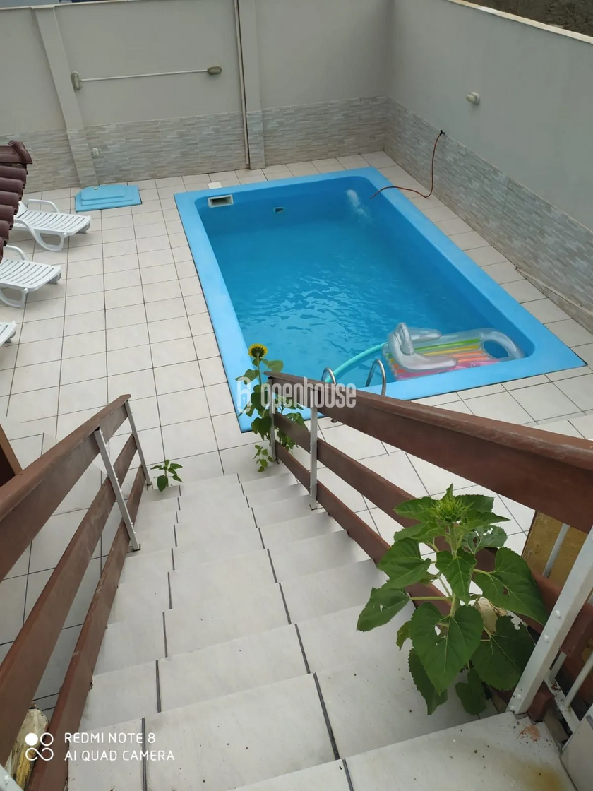 Deslumbrante casa de 4 quartos 2 salas 2 garagem 4 banheiros